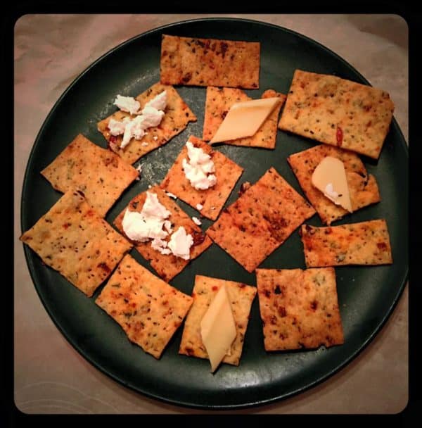 Tomato Basil Cracker on Plate with Toppings